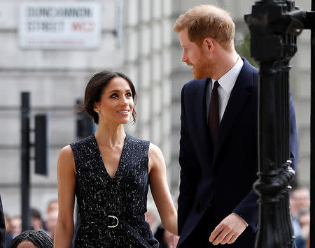 Britain's Prince Harry and his fiancee Meghan Markle arrive at a service at St Martin-in-The Fields to mark 25 years since Stephen Lawrence was killed in a racially motivated attack, in London, Britain. REUTERS/Peter Nicholls