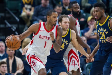 Nov 12, 2017; Indianapolis, IN, USA; Houston Rockets forward Trevor Ariza (1) dribbles the ball while Indiana Pacers forward Bojan Bogdanovic (44) defends in the second half of the game at Bankers Life Fieldhouse. Trevor Ruszkowski-USA TODAY Sports