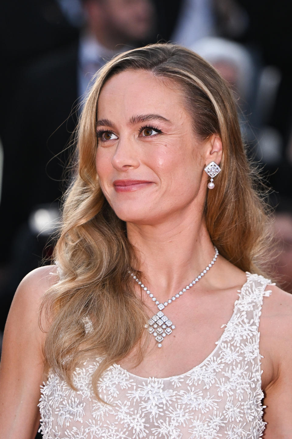 <p>CANNES, FRANCE - MAY 27: Captain Marvel actress, director and member of the Jury, Brie Larson, wore a long dress in white lace with floral motif, look 23, from <a data-i13n="cpos:1;pos:1" href="https://www.chanel.com/sg/" rel="nofollow noopener" target="_blank" data-ylk="slk:Chanel;cpos:1;pos:1;elm:context_link;itc:0;sec:content-canvas" class="link ">Chanel</a> Haute Couture Spring-Summer 2023 collection during the 76th annual Cannes film festival at Palais des Festivals on May 27, 2023 in Cannes, France. (PHOTO: Stephane Cardinale - Corbis/Corbis via Getty Images)</p> 