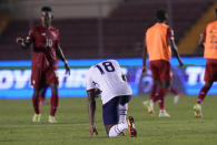 United State's Mark McKenzie, center, reacts after losing to Panama at the end of a qualifying soccer match for the FIFA World Cup Qatar 2022 at Rommel Fernandez stadium, Panama city, Panama, Sunday, Oct. 10, 2021. Panama won 1-0. (AP Photo/Arnulfo Franco)