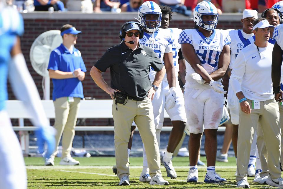 Kentucky head coach Mark Stoops watches during the second half of an NCAA college football game against Mississippi in Oxford, Miss., Saturday, Oct. 1, 2022. Mississippi won 22-19. (AP Photo/Thomas Graning)