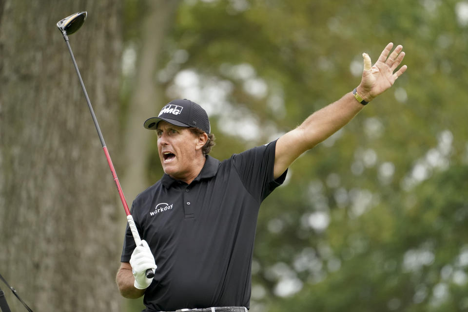 Phil Mickelson, of the United States, reacts after playing his shot from the sixth tee during the first round of the US Open Golf Championship, Thursday, Sept. 17, 2020, in Mamaroneck, N.Y. (AP Photo/John Minchillo)