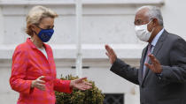 European Commission President Ursula von der Leyen is welcomed by Portuguese Prime Minister Antonio Costa at the Sao Bento palace in Lisbon, Monday, Sept. 28, 2020. (AP Photo/Armando Franca)