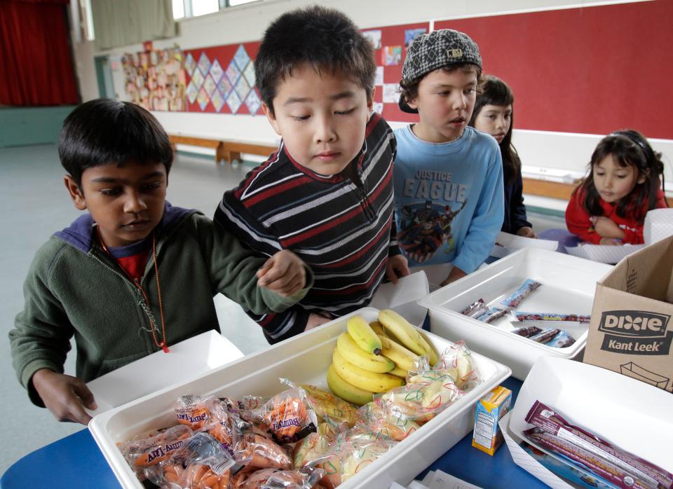 Poll results show 40% of parents with kids in Texas public schools are experiencing one or more symptoms of food insecurity, Stacie Sanchez writes. (AP File Photo/Paul Sakuma)