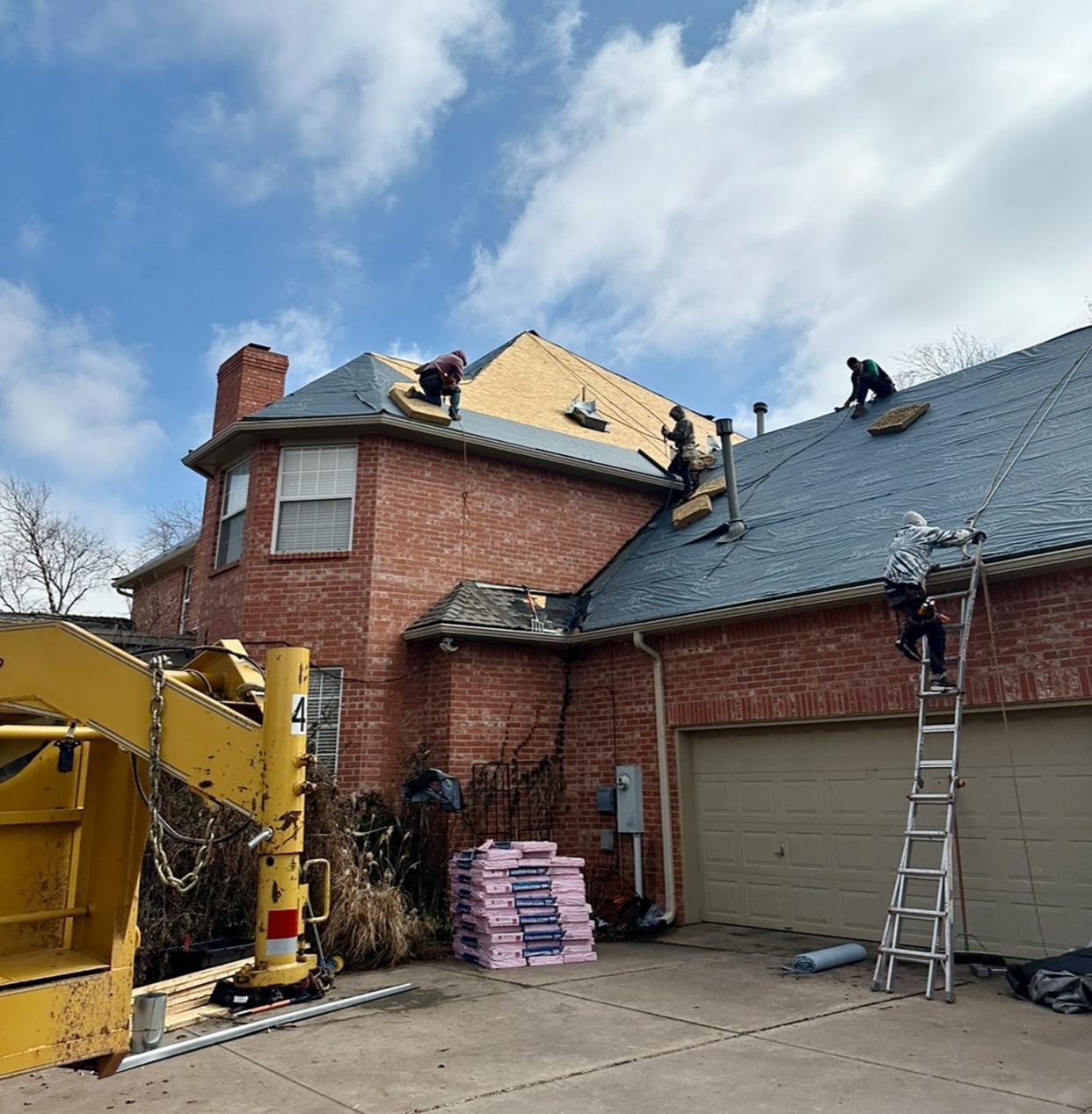 A crew from Graco Roofing & Storage replaces Scott and Deborah Senner's roof in northwest Oklahoma City, unbeknownst to them, while they were out of town. The goof got them a new roof. Graco routinely photographs work in progress, even this job, before they found out they were at the wrong house.