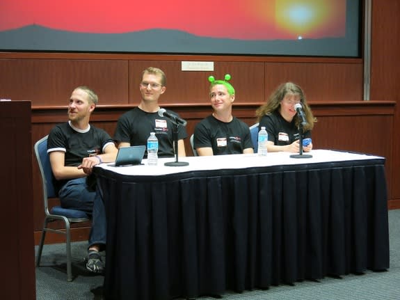 Mars One volunteers for a one-way trip to colonize Mars in 2023 speak during a panel at the Million Martian Meeting in Washington, D.C., on Aug. 3, 2013.