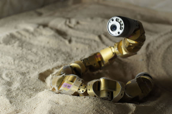 The Carnegie Mellon snake robot has finally mastered the art of slithering up a sandy slope.