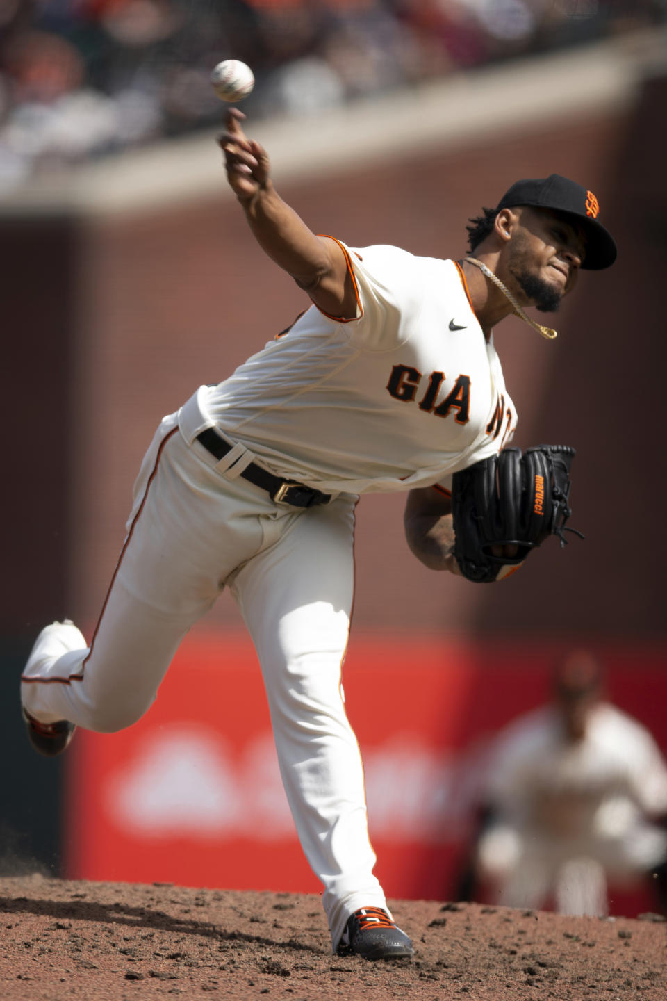 San Francisco Giants pitcher Camilo Doval delivers against the Kansas City Royals during the ninth inning of a baseball game, Saturday, April 8, 2023, in San Francisco. (AP Photo/D. Ross Cameron)