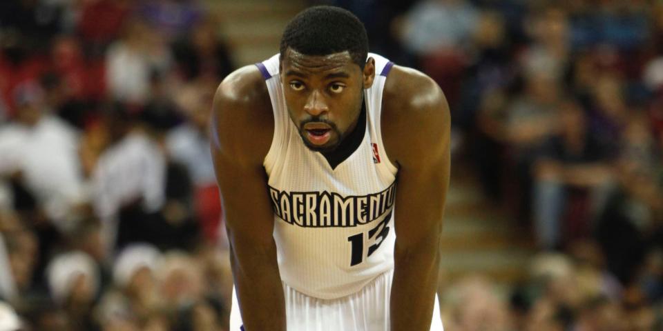 Tyreke Evans stands with his hands on his knees during a game in 2010.