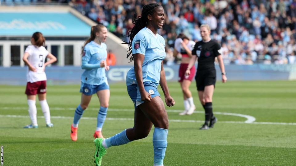 Khadija Shaw celebrates after scoring for Manchester City against West Ham