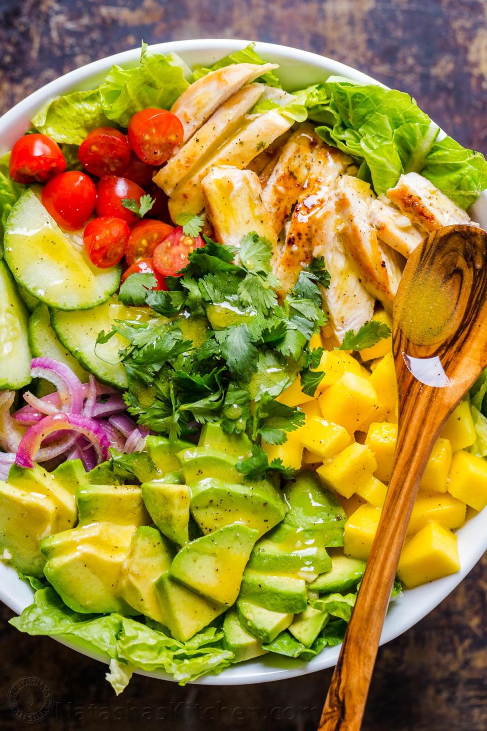 <p>Mangoes add just the right amount of sweetness to complement the juicy chicken and fresh veggies in this salad.</p> <p>Get the recipe <a href="https://natashaskitchen.com/chicken-mango-avocado-salad/" rel="nofollow noopener" target="_blank" data-ylk="slk:here;elm:context_link;itc:0;sec:content-canvas" class="link ">here</a>.</p>