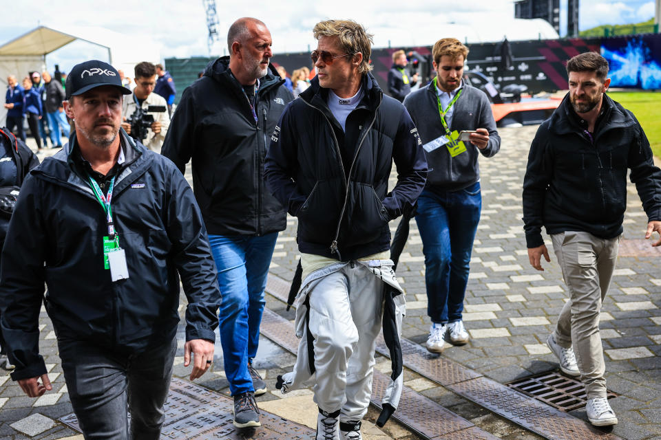  Brad Pitt walks in the paddock during qualifying ahead of the F1 Grand Prix of Great Britain at Silverstone Circuit on July 6, 2024 in Northampton, United Kingdom. 