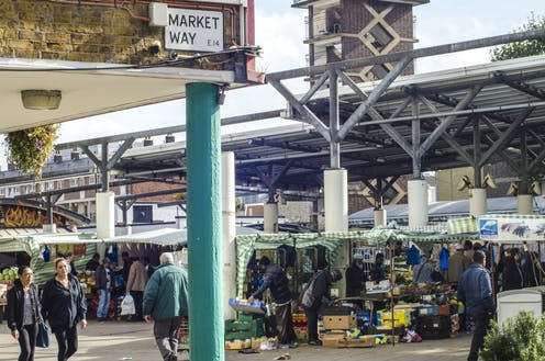 <span class="caption">Local traders win the day at Chrisp Street Market.</span> <span class="attribution"><a class="link " href="https://www.shutterstock.com/image-photo/poplar-london-october-2017-chrisp-street-734267290?src=dxBt2ktp7te6o7MlLZxS0A-1-0" rel="nofollow noopener" target="_blank" data-ylk="slk:Shutterstock.;elm:context_link;itc:0;sec:content-canvas">Shutterstock.</a></span>