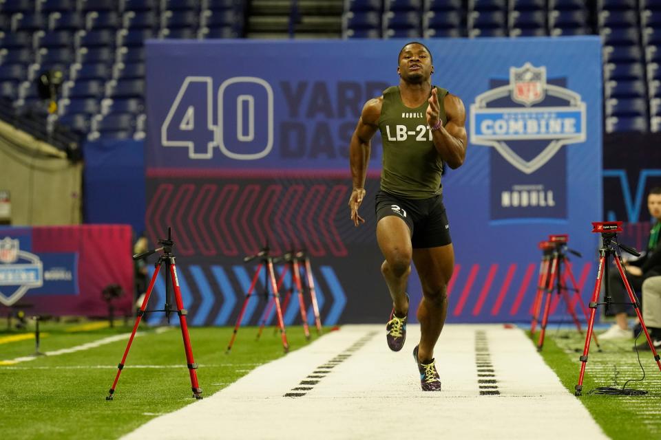 Vanderbilt linebacker Anfernee Orji runs the 40-yard dash at the NFL football scouting combine in Indianapolis, Thursday, March 2, 2023. (AP Photo/Erin Hooley)
