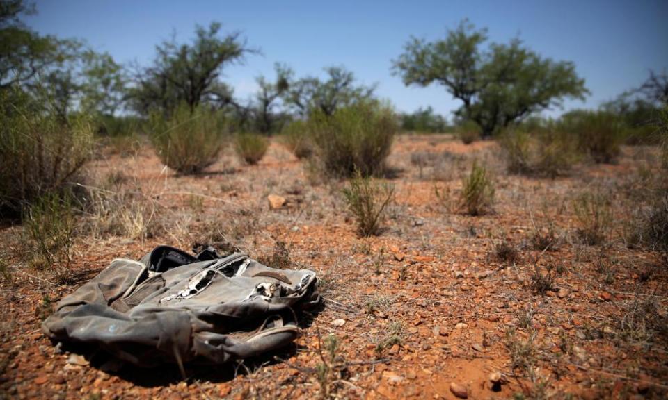 A weathered backpack left behind by a migrant in the desert between Mexico and the US.