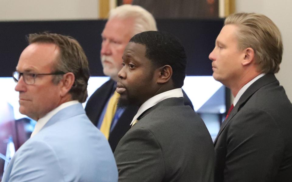 Othal Wallace stands with his defense team, Saturday September 16, 2023, as the verdict is read, convicted of manslaughter in the killing of Daytona Beach Police officer Jason Raynor.