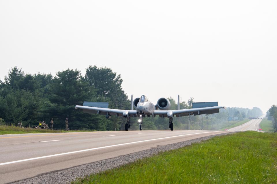 A US  Air Force A-10 Thunderbolt II lands on a Michigan State Highway in Alpena, Michigan, Aug. 5, 2021