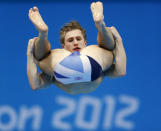 Britain's Jack Laugher fails a dive attempt after slipping off the board during the men's 3m springboard preliminary round at the London 2012 Olympic Games at the Aquatics Centre August 6, 2012. Laugher scored 0 on the dive. REUTERS/Jorge Silva (BRITAIN - Tags: SPORT DIVING OLYMPICS SPORT SWIMMING) 