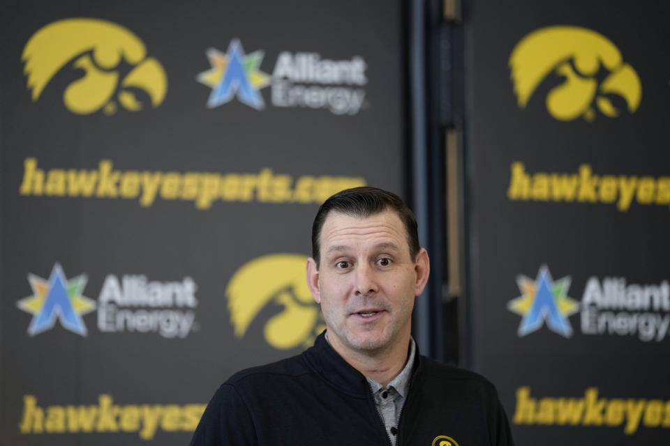 New Iowa offensive coordinator Tim Lester speaks during an NCAA college football news conference, Tuesday, Feb. 6, 2024, in Iowa City, Iowa. (AP Photo/Charlie Neibergall)