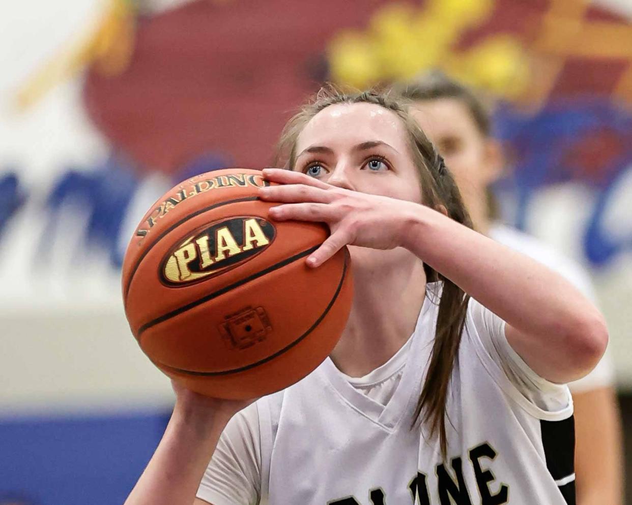 Megan Jacoby (22) eyes up the basket as she shoots two foul shots. The Delone Catholic Squirettes met the Allentown Central Catholic Vikings in the PIAA Class 4A basketball playoffs at Cedar Crest on Wednesday March 15, 2023. The Vikings defeated the Squirettes 51-37.