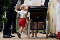 <p>George was photographed peeping into the pram containing his little sister on her <a href="https://www.elle.com/uk/life-and-culture/news/a26292/everything-we-know-about-princess-charlottes-christening/" rel="nofollow noopener" target="_blank" data-ylk="slk:Christening Day in July 2015." class="link rapid-noclick-resp">Christening Day in July 2015.</a></p>