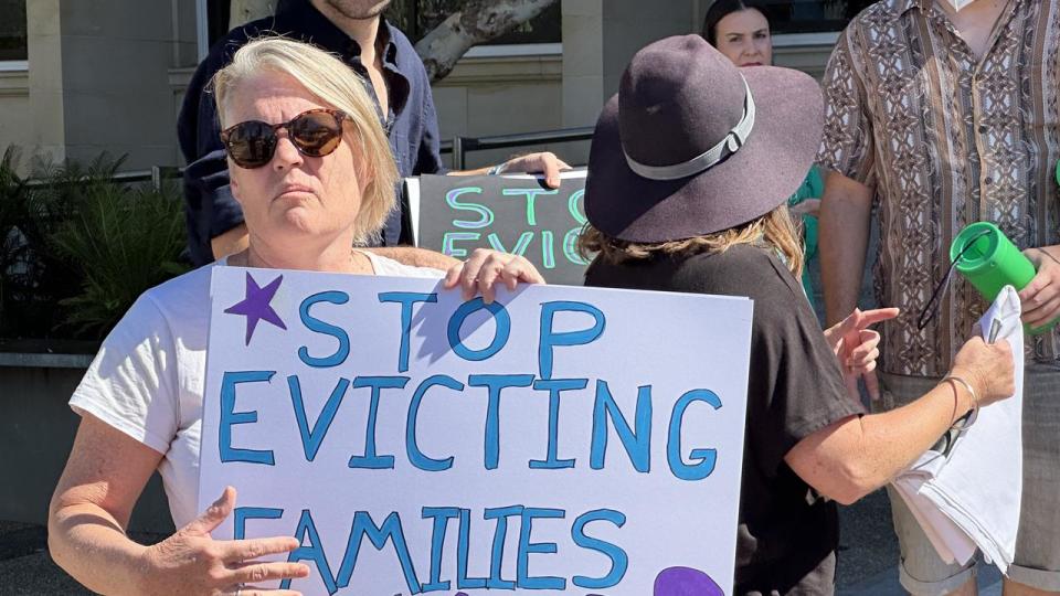 Renters and housing advocates rally at Parliament House in Perth for the state government to end without-grounds evictions.
