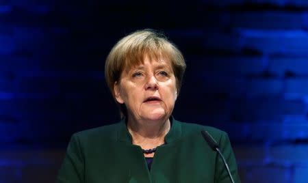 German Chancellor Angela Merkel gives a speech at the 60th anniversary of the founding of the German Intelligence Services (BND) in Berlin, Germany, November 28, 2016. REUTERS/Hannibal Hanschke