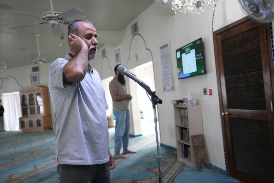 Ahmad Ewais, a Muslim chaplain at the Islamic Community Center of Tempe, leads a call to prayer during a Wednesday afternoon service at the mosque on March 6, 2024.