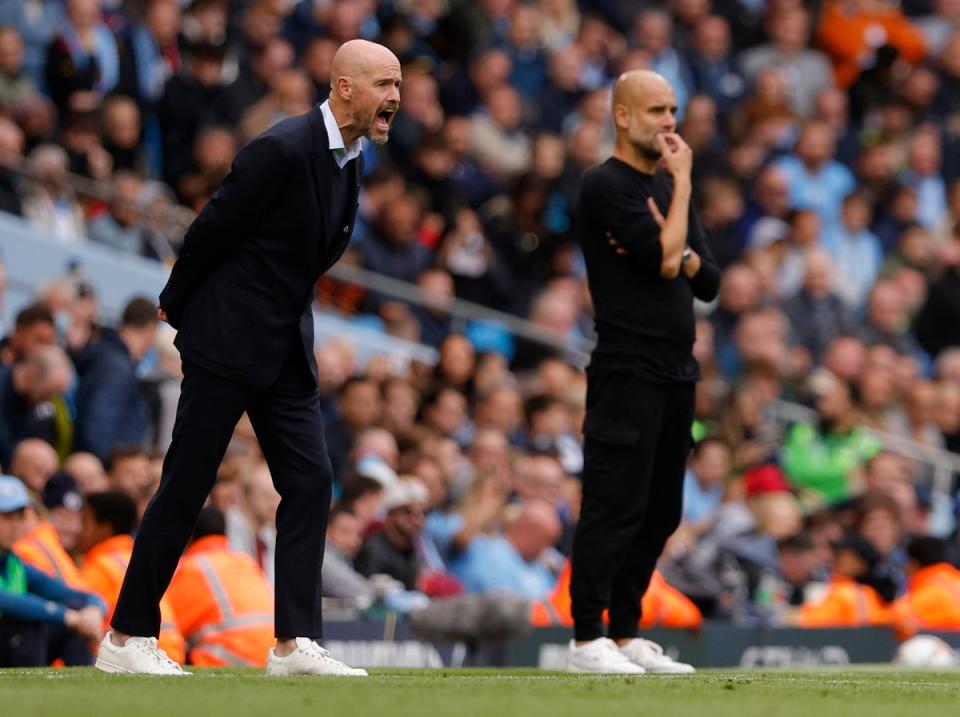 Erik ten Hag (left) reacts during Manchester United’s demolition by City (Manchester United via Getty Imag)