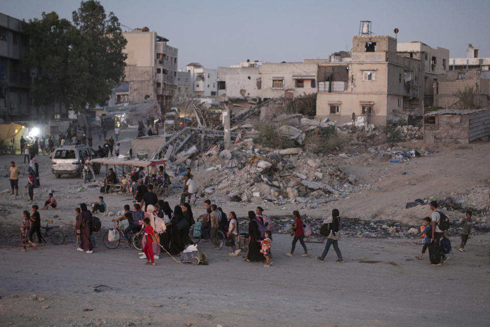 Palestinians displaced by the Israeli air and ground offensive on the Gaza Strip flee from parts of Khan Younis following an evacuation order by the Israeli army to leave the eastern part of Gaza Strip's second largest city on Monday, July 1, 2024. (AP Photo/Jehad Alshrafi)