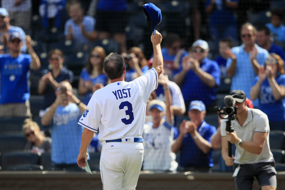 Kansas City Royals manager Ned Yost (3) tips his hat to the crowd before a baseball game against the Minnesota Twins at Kauffman Stadium in Kansas City, Mo., Sunday, Sept. 29, 2019. Yost is managing his last game before retirement. (AP Photo/Orlin Wagner)