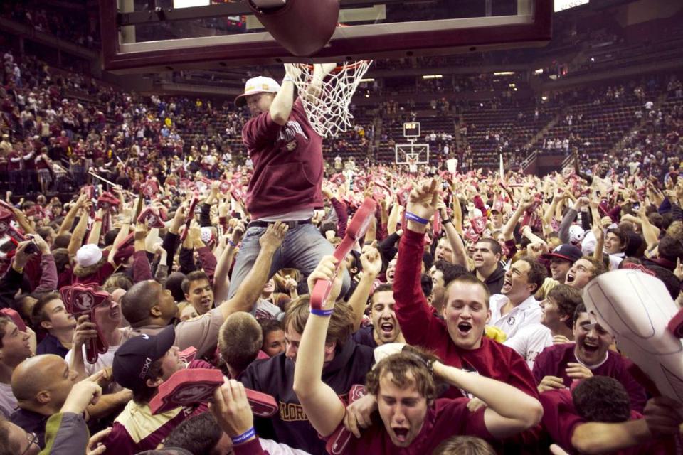 Florida State fans storm the court and celebrate their 90-57 victory over North Carolina on Saturday January 14, 2012 at the Leon County Civic Center in Tallahassee, Florida.