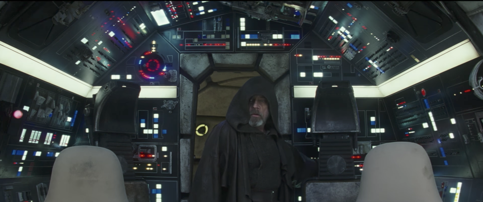 Luke Skywalker (Mark Hamill) enters the cockpit of the <i>Millennium Falcon</i>. (Photo: Lucasfilm)