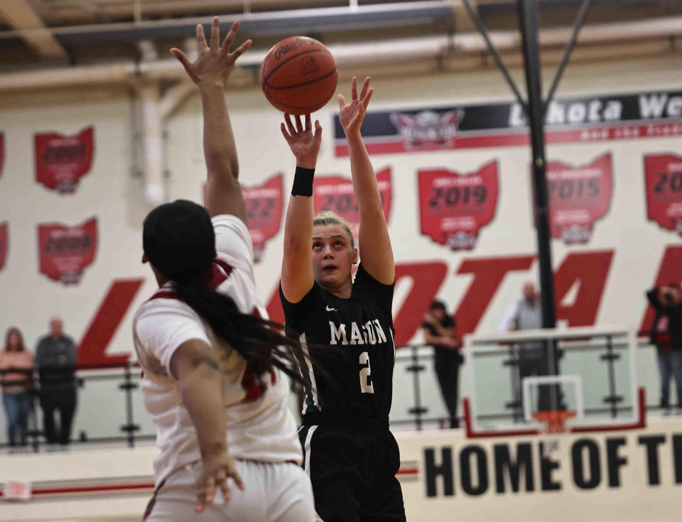 Mason's Carly Prows (2) shoots the ball during the OHSAA Division I regional tournament game between Mason and Princeton Tuesday, Feb. 28, 2023.