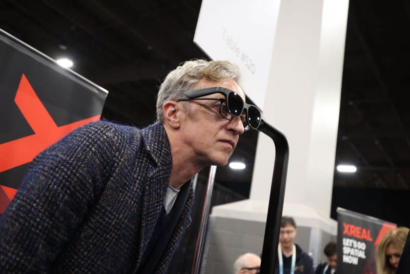 A member of the media tries out the XREAL Air 2 AR Glasses, on display during the 2024 International CES, at the Mandalay Bay Convention Center in Las Vegas on Sunday. Photo by James Atoa/UPI