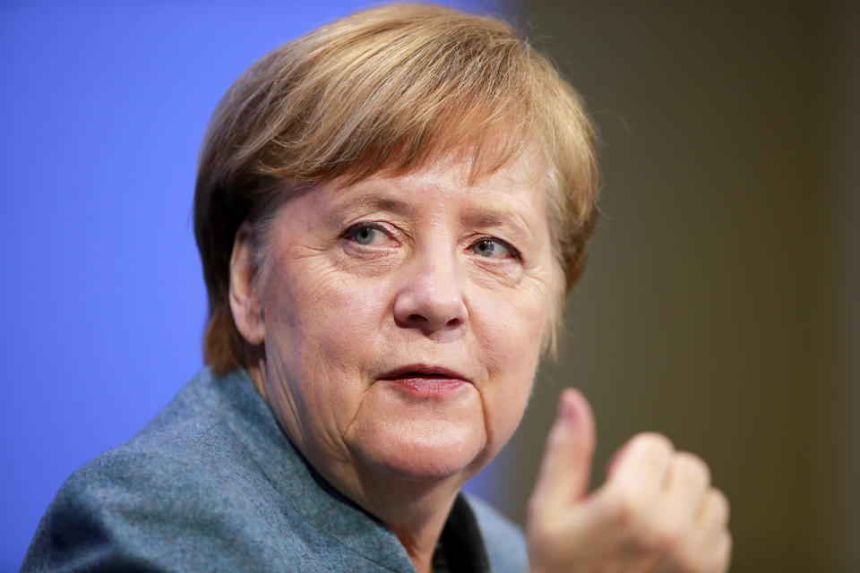 German Chancellor Angela Merkel holds a news conference after meeting with vaccine producers and Germany's state prime ministers via video conference, in Berlin, Germany, Monday Feb. 1, 2021. (Hannibal Hanschke/Pool via AP)