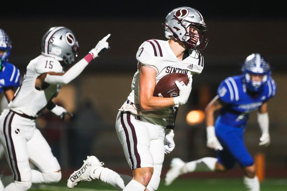 Sinton's Colby Hesseltine (7) runs toward the end zone for a touchdown after catching a pass in a high school football game against Ingleside at Ingleside High School on Friday, Nov. 4, 2022 in Ingleside, Texas.