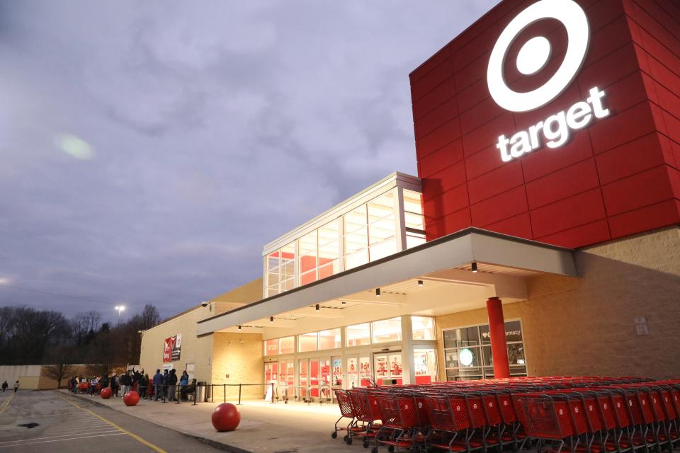 A line of customers stand outside the Poughkeepsie Target at 6:45 a.m. on Nov. 27, 2020.