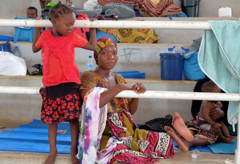 People who fled an attack on the town of Palma are seen at a temporary displacement centre in Pemba