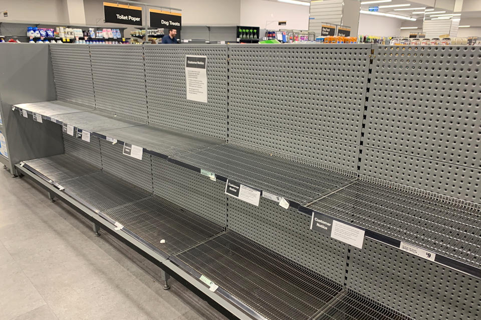 Empty shelves in the toilet paper aisle at Sydney's Woolworths Town Hall.