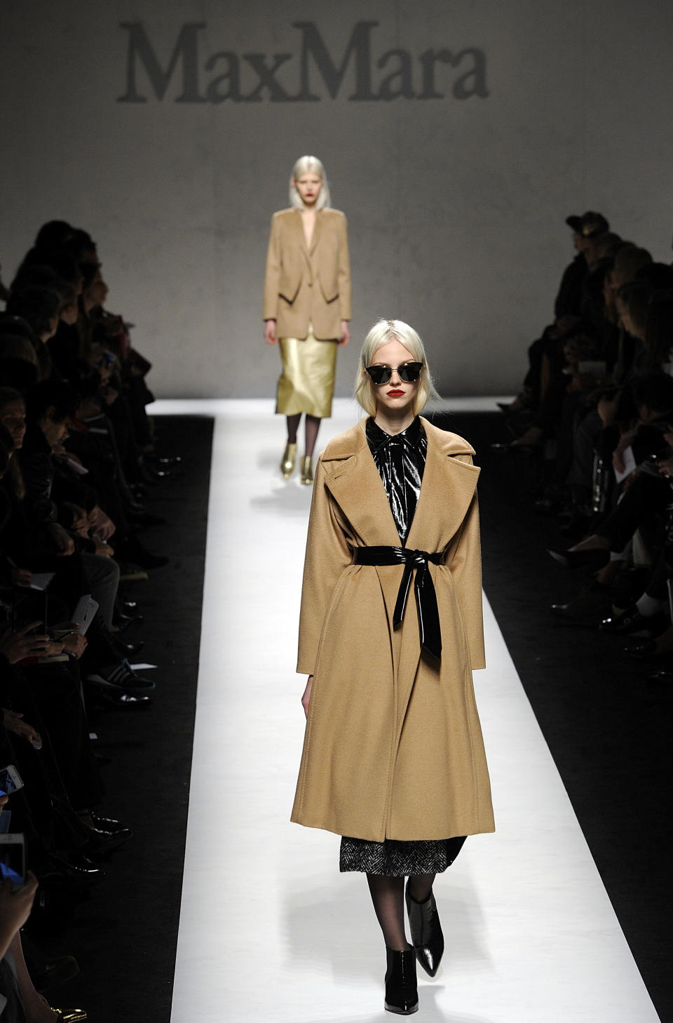 A model wears a creation for Max Mara women's Fall-Winter 2014-15 collection, part of the Milan Fashion Week, unveiled in Milan, Italy, Thursday, Feb. 20, 2014. (AP Photo/Giuseppe Aresu)