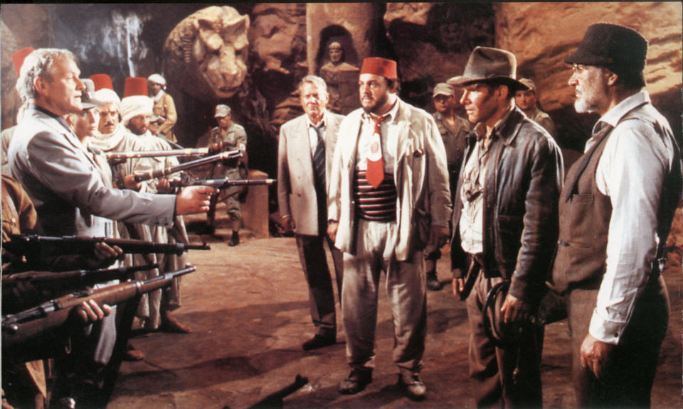 Indiana Jones and the Last Crusade Year: 1989 Harrison Ford , John Rhys-Davies , Sean Connery , Denholm Elliott ,  Director: Steven Spielberg