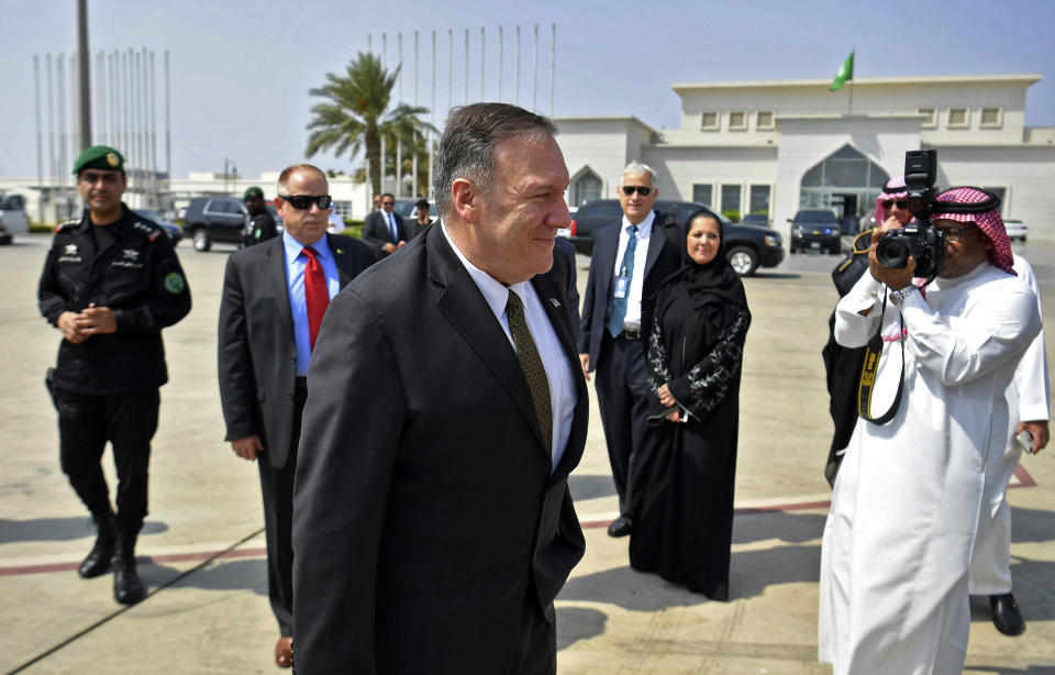 U.S. Secretary of State Mike Pompeo walks from his plane after arriving at al-Bateen Air Base in Abu Dhabi, United Arab Emirates, Thursday, Sept. 19, 2019. (Mandel Ngan/Pool via AP)
