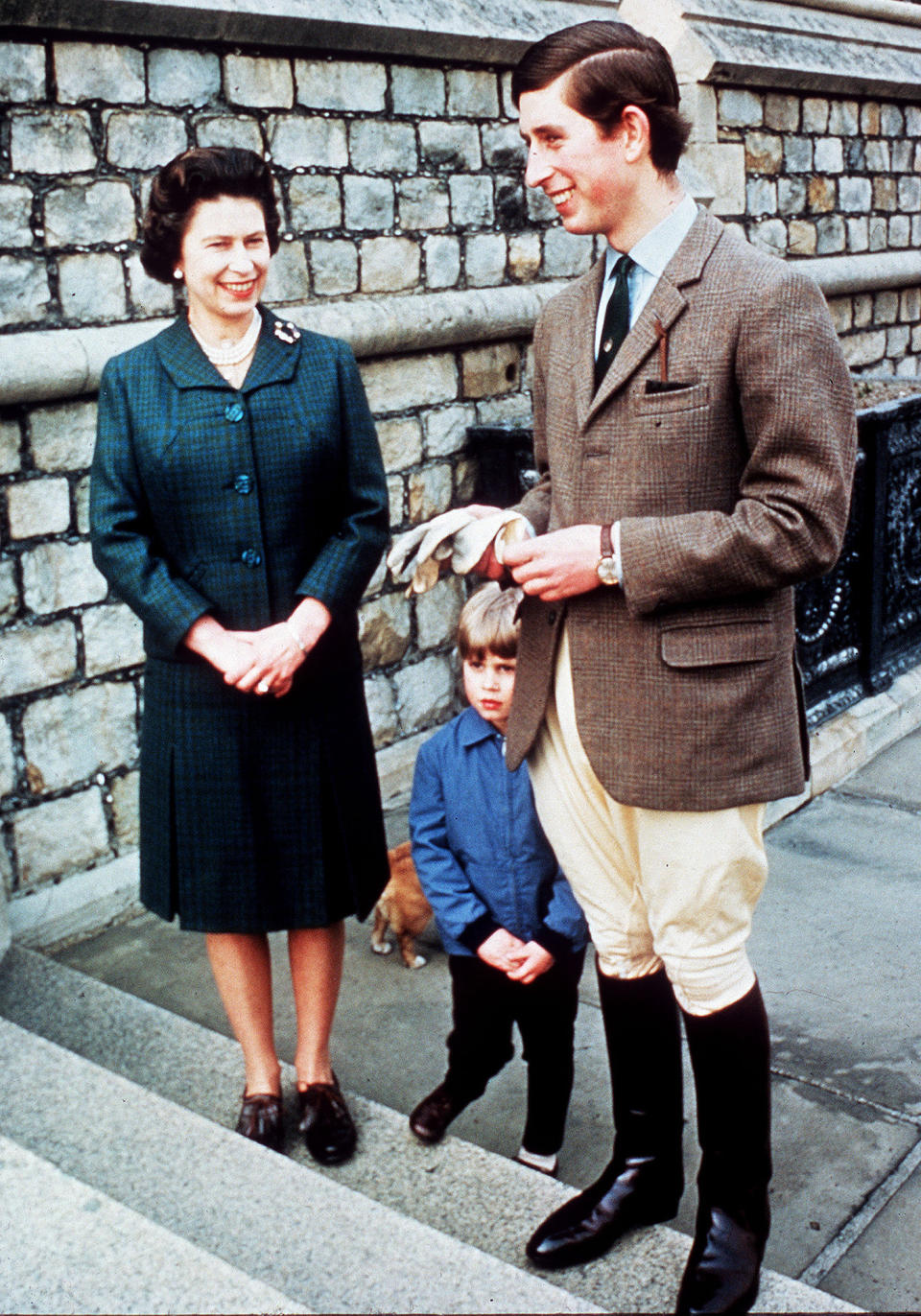 <p>Occasionally, the royal family would share glimpses into their family life, including this sweet shot of the Queen and her eldest son conversing, while her youngest son Edward looks on. </p>