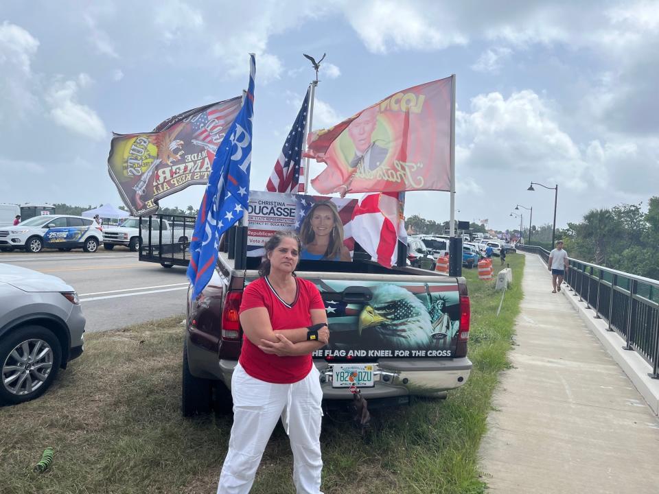 Lisa Blu of Boca Raton was protesting the FBI raid, saying she worried it could happen to others.