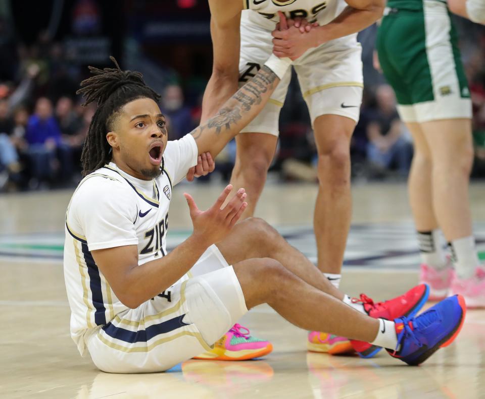 Akron's Greg Tribble (2) reacts after a foul during the second half against Ohio in the semifinals of the Mid-American Conference Tournament on Friday in Cleveland.