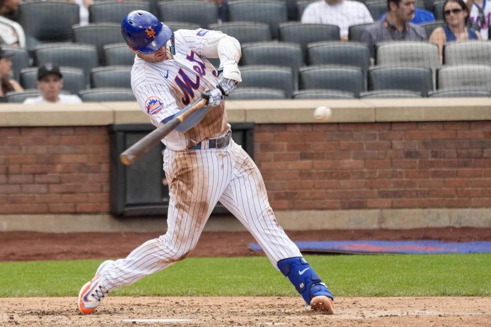 New York Mets' Pete Alonso hits a solo home run during the seventh inning of a baseball game against the Pittsburgh Pirates, Wednesday, Aug. 16, 2023, in New York. (AP Photo/Mary Altaffer)