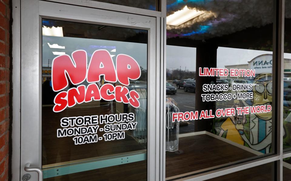 Cousins Ruben Olivares and Sergio Salazar recently opened this new business, Nap Snacks, at 1323 W. 86th St. Imported snacks and drinks are sold at the store. Many of the items are common brands like Oreos, Lays and Fanta, but the flavors and forms are not sold in the U.S. Photo taken Thursday, Jan. 27, 2022.