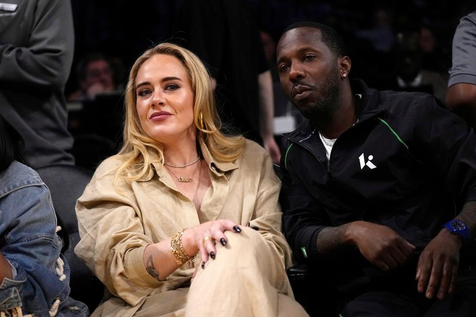 Singer Adele, left, sits with sports agent Rich Paul during the second half in Game 3 of an NBA basketball Western Conference semifinal between the Los Angeles Lakers and the Golden State Warriors Saturday, May 6, 2023, in Los Angeles. (AP Photo/Mark J. Terrill) ORG XMIT: LAS130