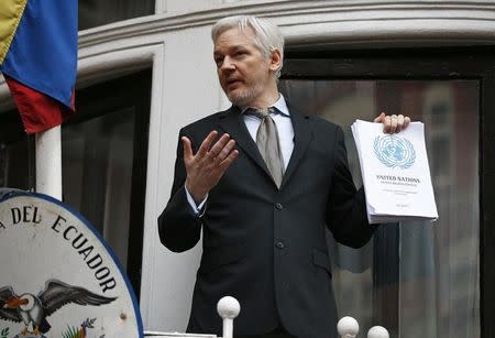 WikiLeaks founder Julian Assange makes a speech from the balcony of the Ecuadorian Embassy, in central London, Britain February 5, 2016. REUTERS/Peter Nicholls